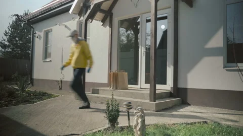 Courier Man Wearing Face Mask And Rubber Gloves Delivery Service Stockbeeldmateriaal 141779277