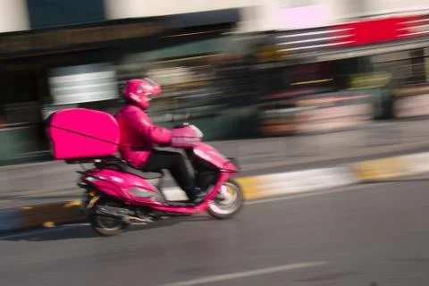 Courier on Motorcycle Stock Photos