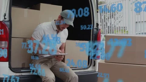Courier starting writing on clip at van rear, checking orders while blue data Stock Footage 334202624