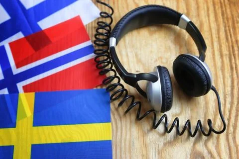 Course language headphone and flag on a table Foto stock