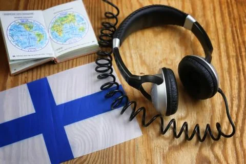 Course language headphone and flag on a table Foto stock