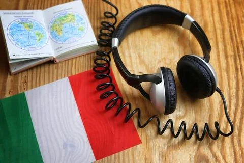 Course language headphone and flag on a table Stock Photos