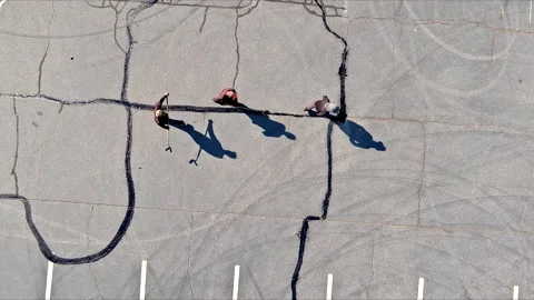 In course of worker patching are filled, asphalt cracks are sealed, bitumen Stock Footage 272922948