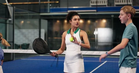 Court, exercise or padel with coach and kids at venue together for instruction Stock Footage 314102922