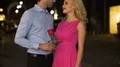 Courteous man gifting rose to his girlfriend whispering compliments in her ear 4k or 4k+ Resolution