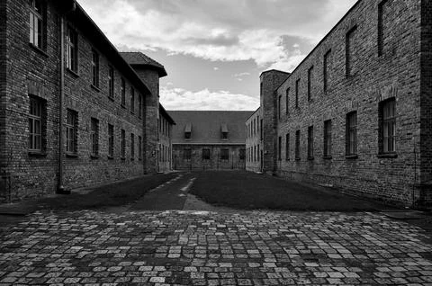 Courtyard between brick barracks blocks at Auschwitz museum Stock Photos