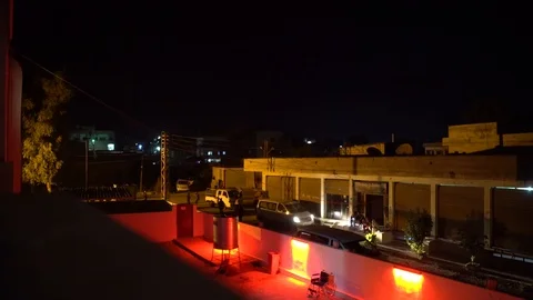 Courtyard of a Compound at Night co Stock Footage 120930782
