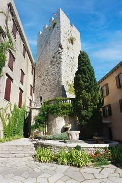 Courtyard of the Gothic Duino Castle on a cliff above the Gulf of Trieste (Ad Stock Photos