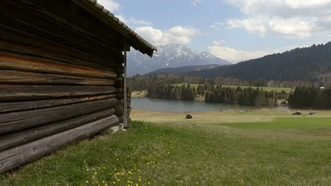 Courtyard in the mountains with the nice view downhill to the lake Stock Footage 74655564