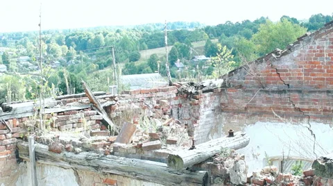 Courtyard of an old building, large Windows, on a background of green plants Stock-Footage 57325213