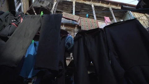 Courtyard of Old Tbilisi with hanging laundry after washing Stock Footage 123723601