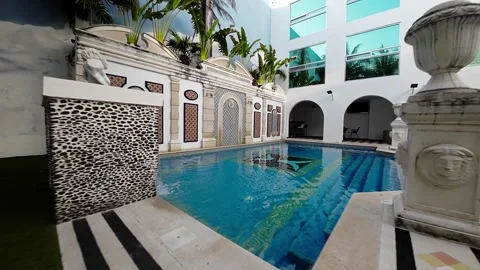 Courtyard with Pool and Murals Stock Footage 278677143