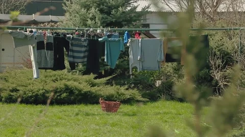 Courtyard of a private house. Laundry drying on a rope Stock Footage 191993903