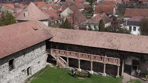 Courtyard of Sukosd Bethlen Castle where groups of visitors are also spotted Stock Footage 186748037