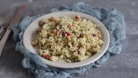 Cous-cous with vegetables on the plate Stock Footage 151589937