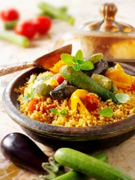 Couscous with fried vegetables Stock Photos