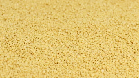 Couscous grains slowly rotating, macro closeup Stock Footage 132643479