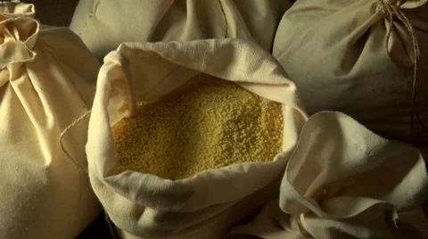 Couscous in a sack Stock Footage 8572334