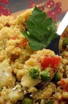 Couscous with vegetables in the fork Stock Photos