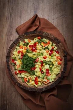 Couscous with vegetables, paprika, carrots, string beans, corn, homemade, top Stock Photos