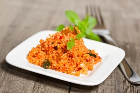 Couscous on wooden table Foto stock