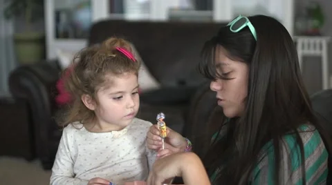 Cousins eating candy together 02 Stock Footage 44477796