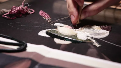 Couture embroidery. Using luneville hook (crochet) with chain stitch Stock Footage 146259977
