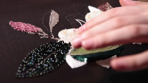 Couture embroidery using Luneville hook (crochet). Chain stitch Stock Footage 146260030