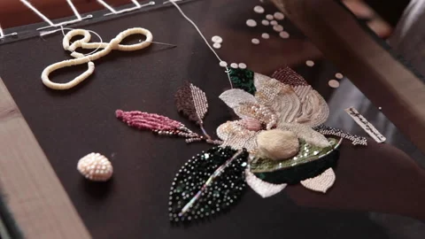 Couture embroidery using Luneville hook (crochet). Chain stitch Stock Footage 146261655