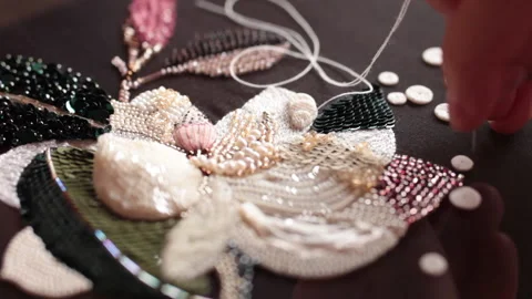 Couture embroidery using Luneville hook (crochet). ?hain stitch Stock Footage 146261871