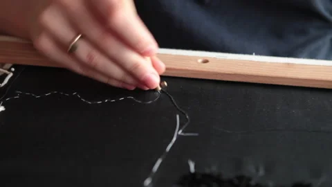 Couture embroidery using Luneville hook (crochet). Chain stitch Stock Footage 146261965