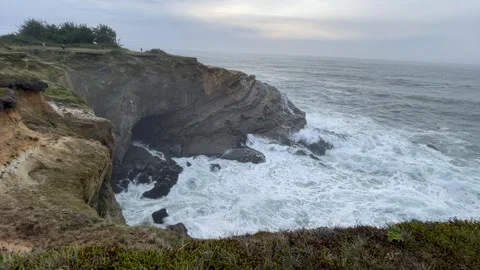 Cove on the Oregon Coast with dramatic waves of the Pacific Ocean Stock Footage 329448788