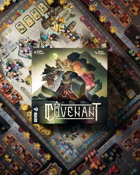 Covenant board game components close up featuring player board building Stock Photos
