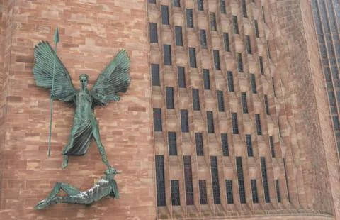 COVENTRY, ENGLAND, UK - 3rd March 2018: St Michael and the Devil sculpture by Stock Photos