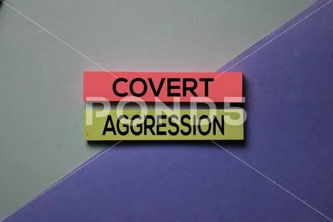 Cover Aggression text on sticky notes isolated on office desk Concept Stock Photos