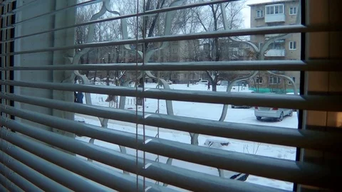Cover the blinds on the window Stock Footage 70988147
