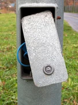 Cover open due to maintenance on electrical lamp post Stock Photos