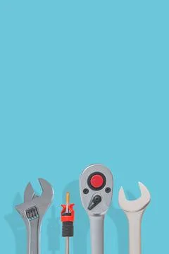 Cover page with a set of workshop tools with shadows at solid turquoise bac.. Stock Photos