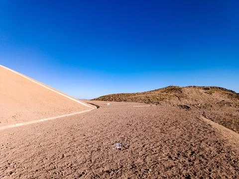 Coverage of clay-type material on geosynthetics in mine fill Stock Photos