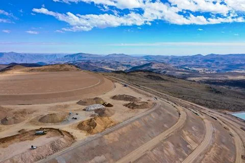 Coverage of clay-type material on geosynthetics in mine fill Stock Photos