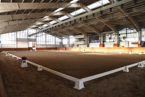 Covered arena building interior without people ready for equestrian trainin.. Stock Photos