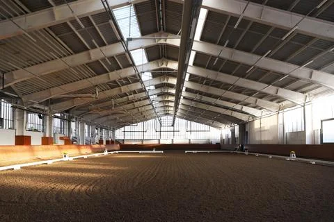 Covered arena building interior without people ready for equestrian trainin.. Stock Photos