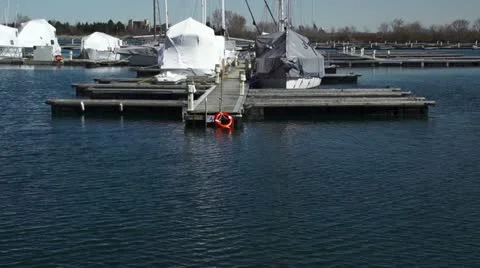 Covered Boats awaiting Springtime HD Stock Footage 10864739