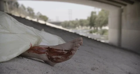 Covered Body Under Bridge Close Up Feet Crime Scene Stock Footage 90876467