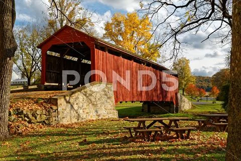 Covered Bridge in Autumn Stock Photos
