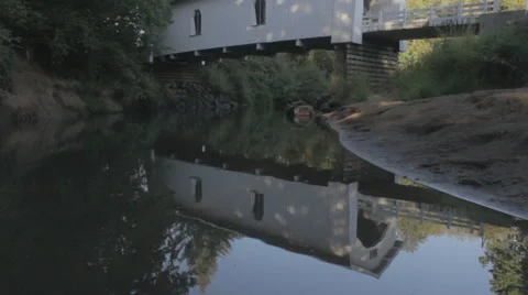 Covered Bridge reflection pan Stock Footage 32638597