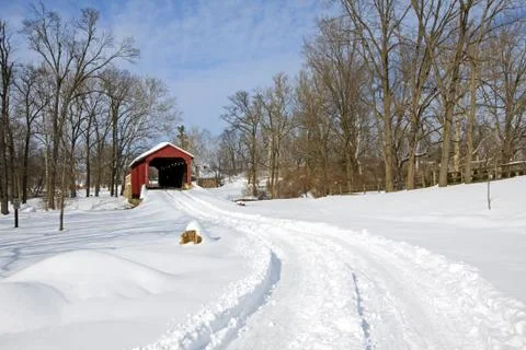 Covered bridge in snow Stock Photos