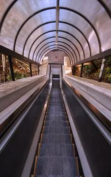 A covered escalator. Stock Photos