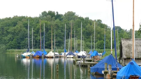 Covered sailboats in the harbor Stock Footage 82623688