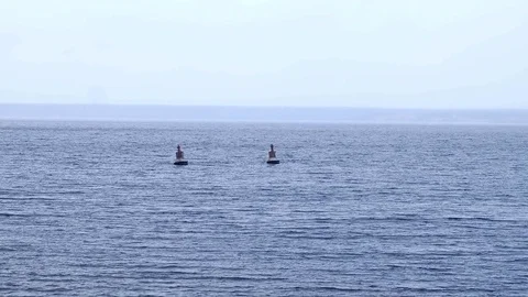 Covered sea smoke on an extremely cold morning archipelago and a navigation buoy Stock Footage 83672172